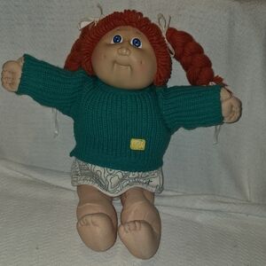 Charming Doll with Teal Sweater and Red Hair